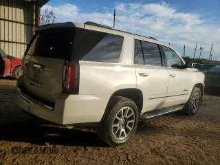 2019 GMC Yukon Denali with VIN 1GKS1CKJ7KR370524, listed as a Copart auction lot 77344394 with 39,753 mi miles and Salvage Title. Bid and sale history available at carsss.com. Image 3.