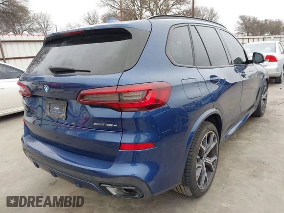 2023 BMW X5 xDrive45e with VIN 5UXTA6C09P9R03213, listed as a IAAI auction lot 41538207 with 25,114 mi miles. Bid and sale history available at carsss.com. Image 4.
