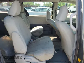 2012 Toyota Sienna with VIN 5TDZK3DC8CS198495, listed as a Copart auction lot 57335205 with 66,786 mi miles and Salvage title. Bid and sale history available at DreamBid. Image 11.
