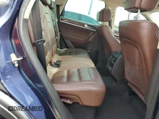 2013 Volkswagen Touareg Lux с VIN WVGEF9BP0DD002456, выставлен на аукционе Copart как лот 56034435 с пробегом 131 412 миль миль и Списание • Salvage title. История ставок и продаж доступна на DreamBid. Изображение 11.
