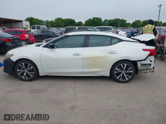 2017 Nissan Maxima SV with VIN 1N4AA6AP4HC382436, listed as a IAAI auction lot 41916548 with 156,110 mi miles and . Bid and sale history available at DreamBid. Image 14.