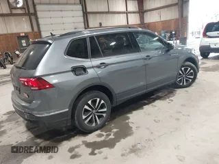 2022 Volkswagen Tiguan S z VIN 3VV0B7AX2NM042934, wystawiony jako IAAI lot #42172199 z przebiegiem 71 367 mil mil oraz . Historia ofert i sprzedaży dostępna na DreamBid. Obrazek 4.