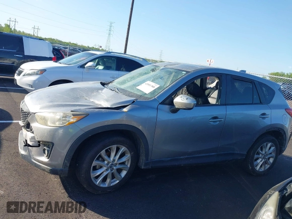 2013 Mazda CX-5 Grand Touring with VIN JM3KE2DEXD0130585, listed as a IAAI auction lot 42001388 with 66,348 mi miles. Bid and sale history available at carsss.com. Image 14.