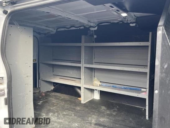 2023 Ford Transit Cargo with VIN 1FTYE1Y8XPKB26711, listed as a Copart auction lot 87334874 with 31,745 mi miles and Salvage Title. Bid and sale history available at DreamBid. Image 6.