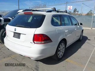 2012 Volkswagen Jetta SportWagen TDI with VIN 3VWPL7AJ0CM688196, listed as a IAAI auction lot 41428539 with 144,192 mi miles. Bid and sale history available at carsss.com. Image 4.