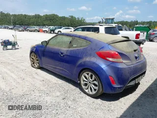 2012 Hyundai Veloster w/Gray Int with VIN KMHTC6AD7CU050444, listed as a IAAI auction lot 42170272 with 121,478 mi miles and . Bid and sale history available at DreamBid. Image 3.