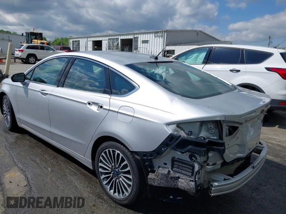 2017 Ford Fusion Titanium with VIN 3FA6P0K90HR266556, listed as a IAAI auction lot 41947924 with 135,628 mi miles. Bid and sale history available at carsss.com. Image 3.