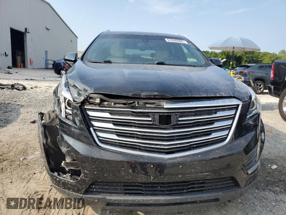 2017 Cadillac XT5 FWD with VIN 1GYKNARS0HZ283618, listed as a Copart auction lot 61640005 with 113,823 mi miles and Salvage title. Bid and sale history available at DreamBid. Image 5.