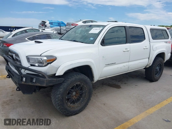 2017 Toyota Tacoma SR5 z VIN 5TFCZ5ANXHX065886, wystawiony jako IAAI lot #42308228 z przebiegiem 294 931 mil mil oraz . Historia ofert i sprzedaży dostępna na DreamBid. Obrazek 18.