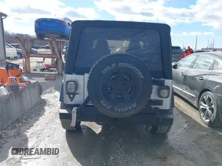 2005 Jeep Wrangler Unlimited with VIN 1J4FA44S25P340852, listed as a IAAI auction lot 41441671 with 139,302 mi miles. Bid and sale history available at carsss.com. Image 16.
