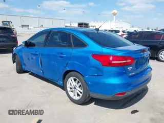 2015 Ford Focus SE with VIN 1FADP3F21FL379837, listed as a IAAI auction lot 42021623 with 146,571 mi miles. Bid and sale history available at carsss.com. Image 3.