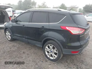 2014 Ford Escape Titanium with VIN 1FMCU9J90EUC24898, listed as a IAAI auction lot 42166523 with 152,464 mi miles and . Bid and sale history available at DreamBid. Image 3.