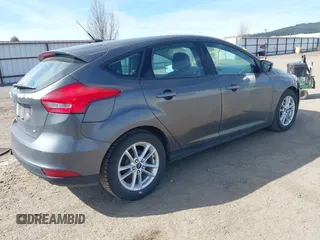 2015 Ford Focus SE with VIN 1FADP3K2XFL306858, listed as a IAAI auction lot 41895767 with 79,566 mi miles. Bid and sale history available at carsss.com. Image 4.