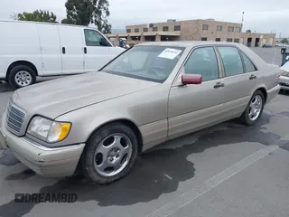 1997 Mercedes-Benz S-Class with VIN WDBGA32G1VA349367, listed as a IAAI auction lot 42079132 with 383,250 mi miles. Bid and sale history available at carsss.com. Image 2.