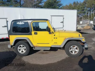 2005 Jeep Wrangler X with VIN 1J4FA39S25P374373, listed as a IAAI auction lot 41754017 with 195,156 mi miles. Bid and sale history available at carsss.com. Image 13.