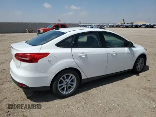2018 Ford Focus SE z VIN 1FADP3F25JL272797, wystawiony jako Copart lot #54626215 z przebiegiem 116 679 mil mil oraz Szkoda całkowita • Salvage title. Historia ofert i sprzedaży dostępna na DreamBid. Obrazek 3.