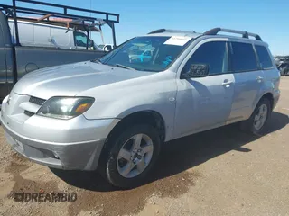 2003 Mitsubishi Outlander XLS with VIN JA4LX41G73U044032, listed as a IAAI auction lot 41794058 with 285,734 mi miles. Bid and sale history available at carsss.com. Image 2.