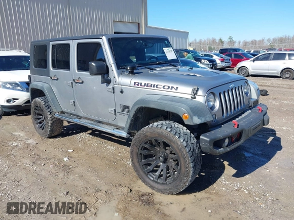 2015 Jeep Wrangler Unlimited Rubicon Hard Rock with VIN 1C4HJWFG2FL587607, listed as a IAAI auction lot 41419237 with 109,719 mi miles and . Bid and sale history available at DreamBid. Image 1.