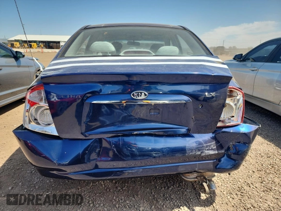 2006 Kia Spectra EX with VIN KNAFE121965253446, listed as a Copart auction lot 53084675 with 195,488 mi miles and Salvage Title. Bid and sale history available at DreamBid. Image 6.