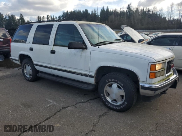 1997 GMC Yukon with VIN 1GKEK13R5VJ762200, listed as a Copart auction lot 47579745 with 165,573 mi miles and Clean Title. Bid and sale history available at carsss.com. Image 4.