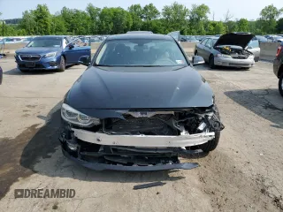 2018 BMW 3 Series 320i xDrive z VIN WBA8A3C50JA489629, wystawiony jako Copart lot #59535745 z przebiegiem 75 941 mil mil oraz Szkoda całkowita • Salvage title. Historia ofert i sprzedaży dostępna na DreamBid. Obrazek 5.