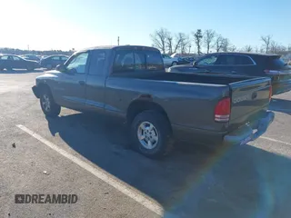 2002 Dodge Dakota Sport with VIN 1B7GL32X52S564722, listed as a IAAI auction lot 41455669 with 211,890 mi miles. Bid and sale history available at carsss.com. Image 3.