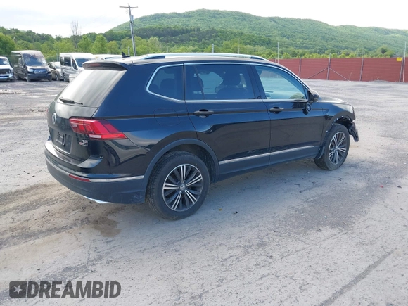 2018 Volkswagen Tiguan SEL z VIN 3VV2B7AXXJM145781, wystawiony jako IAAI lot #42273176 z przebiegiem 86 610 mil mil oraz . Historia ofert i sprzedaży dostępna na DreamBid. Obrazek 4.
