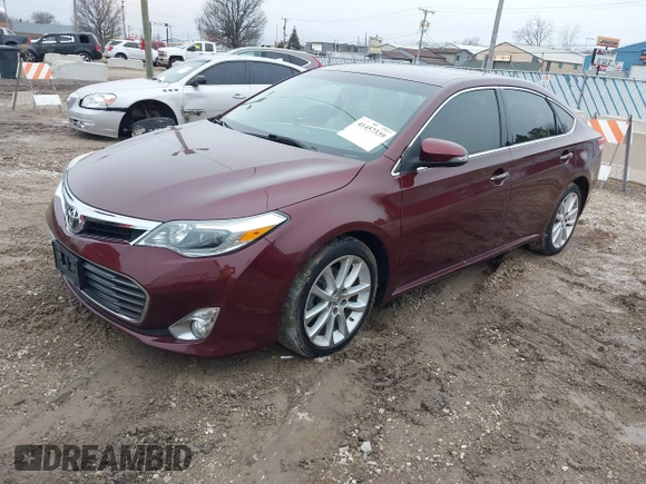 2015 Toyota Avalon Limited with VIN 4T1BK1EB7FU167777, listed as a IAAI auction lot 41457339 with 98,239 mi miles and . Bid and sale history available at DreamBid. Image 2.