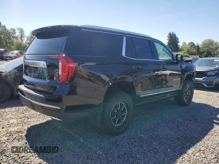 2023 GMC Yukon Denali with VIN 1GKS2DKT9PR158736, listed as a Copart auction lot 69765034 with 22,042 mi miles and Salvage Title. Bid and sale history available at carsss.com. Image 3.