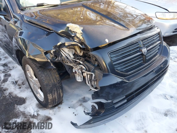 2009 Dodge Caliber SXT with VIN 1B3HB48A89D118869, listed as a IAAI auction lot 41315552 with 198,986 mi miles and . Bid and sale history available at DreamBid. Image 6.