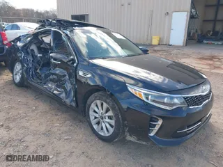 2017 Kia Optima EX with VIN 5XXGU4L33HG135421, listed as a IAAI auction lot 41738011 with 128,594 mi miles. Bid and sale history available at carsss.com. Image 1.