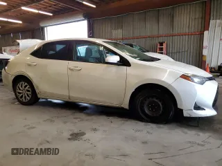 2019 Toyota Corolla L z VIN 5YFBURHEXKP940266, wystawiony jako Copart lot #47655575 z przebiegiem 119 022 mil mil oraz Szkoda całkowita • Salvage title. Historia ofert i sprzedaży dostępna na DreamBid. Obrazek 4.