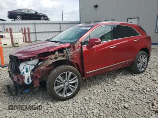 2023 Cadillac XT5 AWD Premium Luxury with VIN 1GYKNDR43PZ205643, listed as a Copart auction lot 64576605 with 12,184 mi miles and Salvage title. Bid and sale history available at DreamBid. Image 1.
