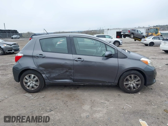 2013 Toyota Yaris L with VIN JTDKTUD30DD563270, listed as a IAAI auction lot 41997725 with 131,663 mi miles. Bid and sale history available at carsss.com. Image 12.