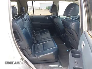 2009 Honda Pilot Touring with VIN 5FNYF48969B018075, listed as a IAAI auction lot 42052333 with 206,700 mi miles and . Bid and sale history available at carsss.com. Image 8.