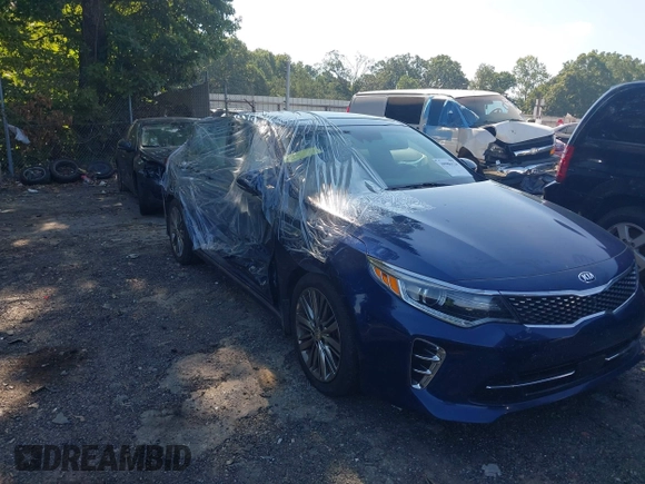 2016 Kia Optima SXL Turbo with VIN 5XXGV4L28GG087563, listed as a IAAI auction lot 39986124 with 180,160 mi miles. Bid and sale history available at carsss.com. Image 1.
