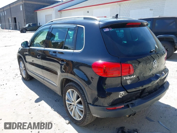 2012 Volkswagen Tiguan SEL with VIN WVGAV7AX2CW529232, listed as a IAAI auction lot 41955121 with 164,885 mi miles and . Bid and sale history available at DreamBid. Image 3.