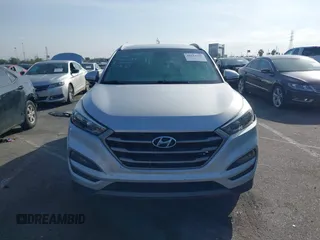 2016 Hyundai Tucson Sport with VIN KM8J33A20GU165154, listed as a IAAI auction lot 41611785 with Not Provided miles. Bid and sale history available at carsss.com. Image 11.