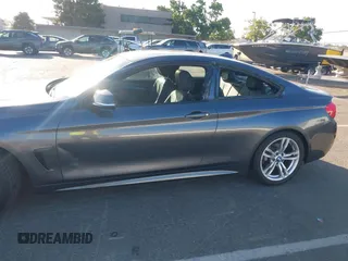 2014 BMW 4 Series 428i with VIN WBA3N7C57EK220498, listed as a IAAI auction lot 42608688 with 157,523 mi miles and . Bid and sale history available at DreamBid. Image 6.