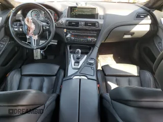2015 BMW M6 z VIN WBS6C9C56FD467608, wystawiony jako Copart lot #67796074 z przebiegiem 67 706 mil mil oraz Szkoda całkowita • Salvage title. Historia ofert i sprzedaży dostępna na DreamBid. Obrazek 8.