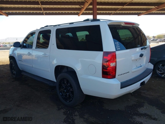 2012 Chevrolet Suburban LT with VIN 1GNSCJE05CR318556, listed as a IAAI auction lot 41654002 with 222,329 mi miles. Bid and sale history available at carsss.com. Image 3.