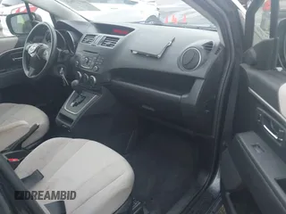 2015 Mazda 5 Sport with VIN JM1CW2BL3F0188052, listed as a IAAI auction lot 40777036 with 69,405 mi miles. Bid and sale history available at carsss.com. Image 5.