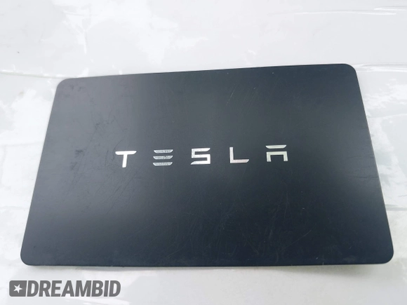 2023 Tesla Model 3 with VIN 5YJ3E1EA5PF647737, listed as a IAAI auction lot 42430145 with 20,525 mi miles and . Bid and sale history available at DreamBid. Image 11.