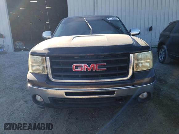 2011 GMC Sierra 1500 Work Truck z VIN 1GTN1TEX0BZ232607, wystawiony jako Copart lot #81737074 z przebiegiem 216 005 mil mil oraz Szkoda całkowita • Salvage title. Historia ofert i sprzedaży dostępna na DreamBid. Obrazek 5.