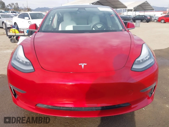 2020 Tesla Model 3 Standard Range Plus with VIN 5YJ3E1EA9LF718027, listed as a IAAI auction lot 41679320 with 68,987 mi miles. Bid and sale history available at carsss.com. Image 12.