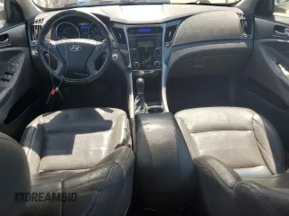 2012 Hyundai Sonata Hybrid z VIN KMHEC4A42CA032867, wystawiony jako Copart lot #61369295 z przebiegiem 151 751 mil mil oraz Czysty tytuł • Clean title. Historia ofert i sprzedaży dostępna na DreamBid. Obrazek 8.