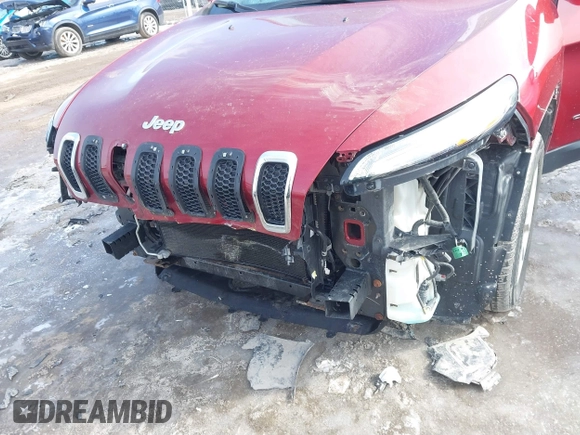 2015 Jeep Cherokee Latitude with VIN 1C4PJLCB8FW612284, listed as a IAAI auction lot 41578838 with 101,458 mi miles and . Bid and sale history available at DreamBid. Image 6.