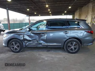 2019 Infiniti QX60 Luxe with VIN 5N1DL0MM8KC558679, listed as a IAAI auction lot 41973649 with 51,867 mi miles and . Bid and sale history available at DreamBid. Image 15.