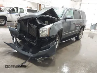 2019 GMC Yukon Denali with VIN 1GKS2CKJ9KR359070, listed as a IAAI auction lot 41682027 with 95,015 mi miles. Bid and sale history available at carsss.com. Image 2.