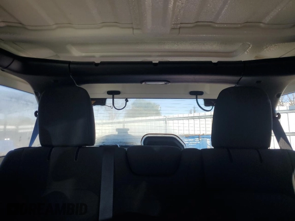 2023 Jeep Wrangler Sport S with VIN 1C4HJXDG5PW623797, listed as a Copart auction lot 50258875 with 16,518 mi miles and Salvage Title. Bid and sale history available at DreamBid. Image 10.